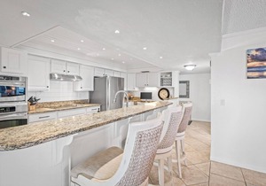 Luxury direct oceanfront 3/3 corner penthouse with heated pool and garage parking