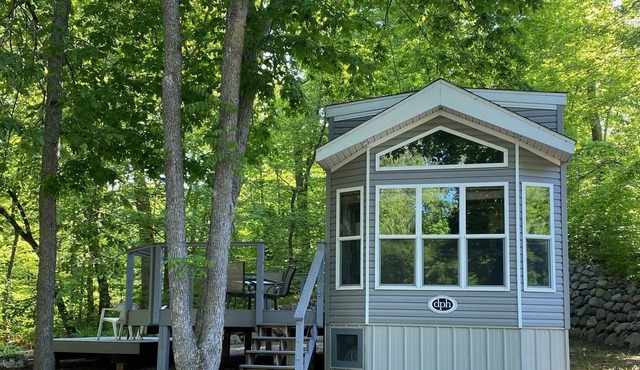 Cozy cabin on a private wooded lot.