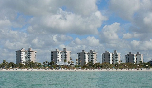 Penthouse water views! 4 minute walk across the street to the beach!