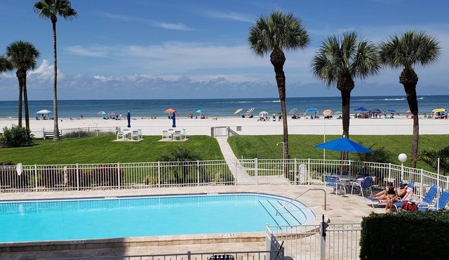 Stunning Ocean Beach Front Condo, Two King Beds, with Cottage Charm